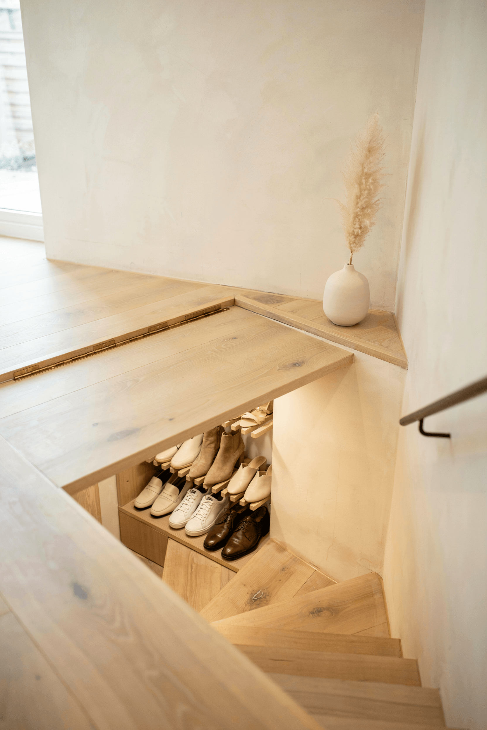Hidden Shoe Storage in Stairs Landing – home decor idea